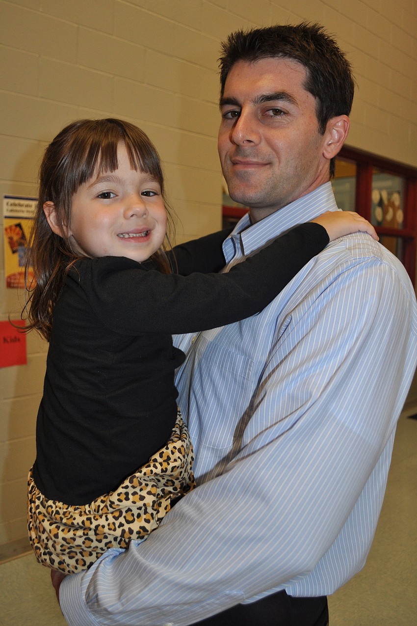 Gianna Smith, 5, and her dad, Damion DeStefano, were eager to have their photograph taken.
