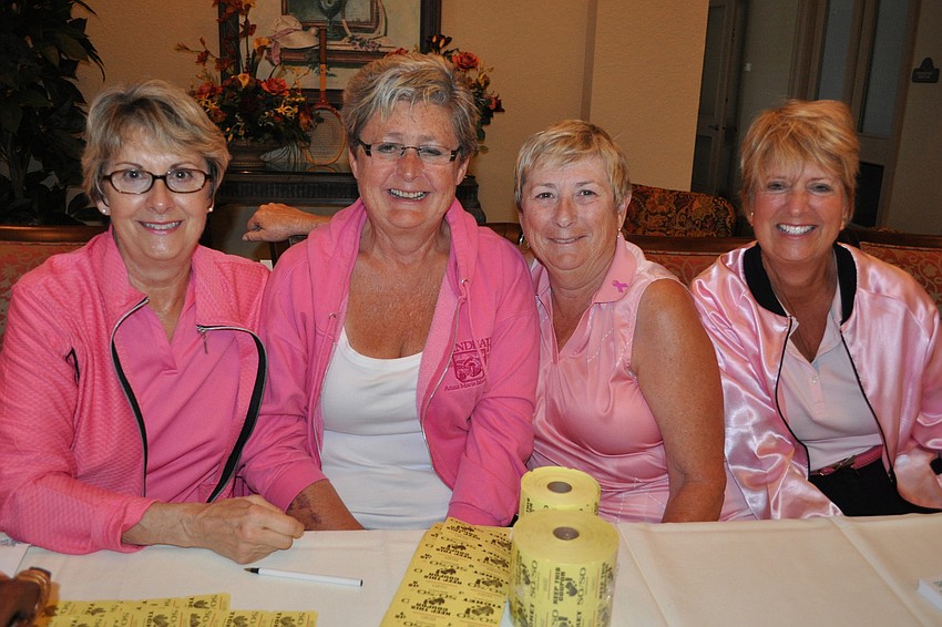 Janice Woods, Mary Thibault, Nancy Foley and Gail Zinn sold 50/50 raffle tickets and mulligan cards.