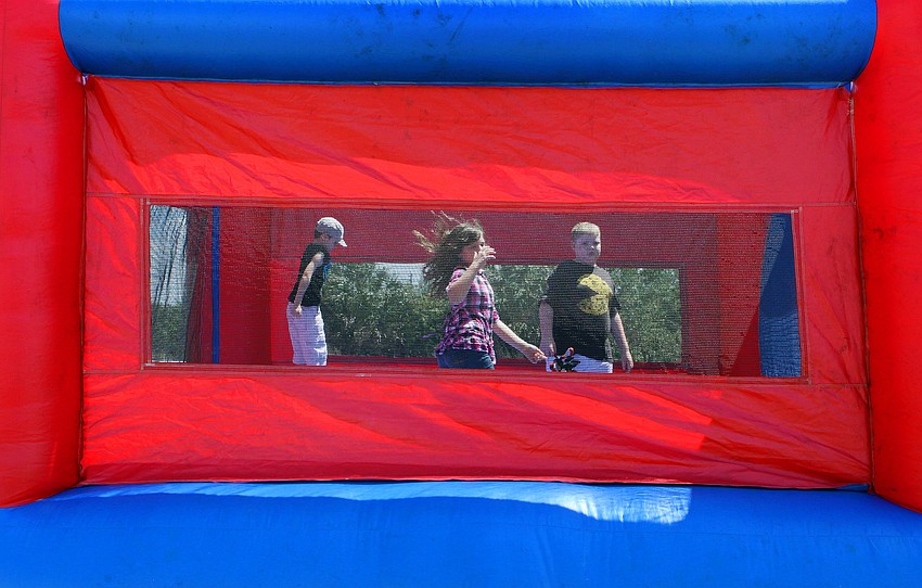 Kids had fun bouncing around in the bounce house at Springfest.