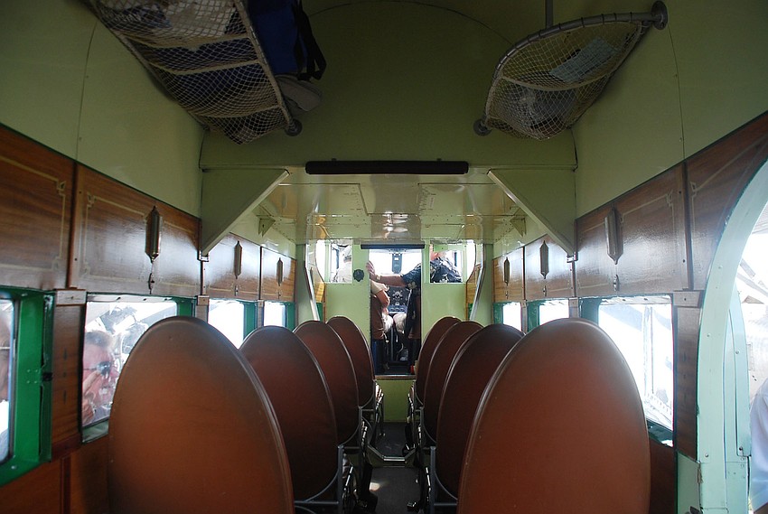 There are nine seats each with a window. In the late 1970s EAA purchased the Tri-Motor and began a 12-year restoration. For her 75th birthday, she was given another makeover in 2003/04.