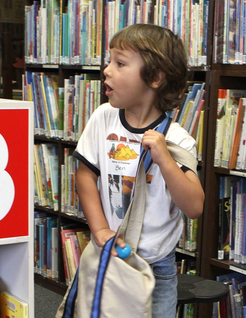 Ben Vaughan, 4, gets excited as he spies yet another egg, Saturday, March 31.