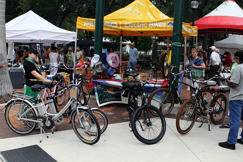 Many people looked at the electric bikes that were on display and for sale at EcoFest on Saturday.