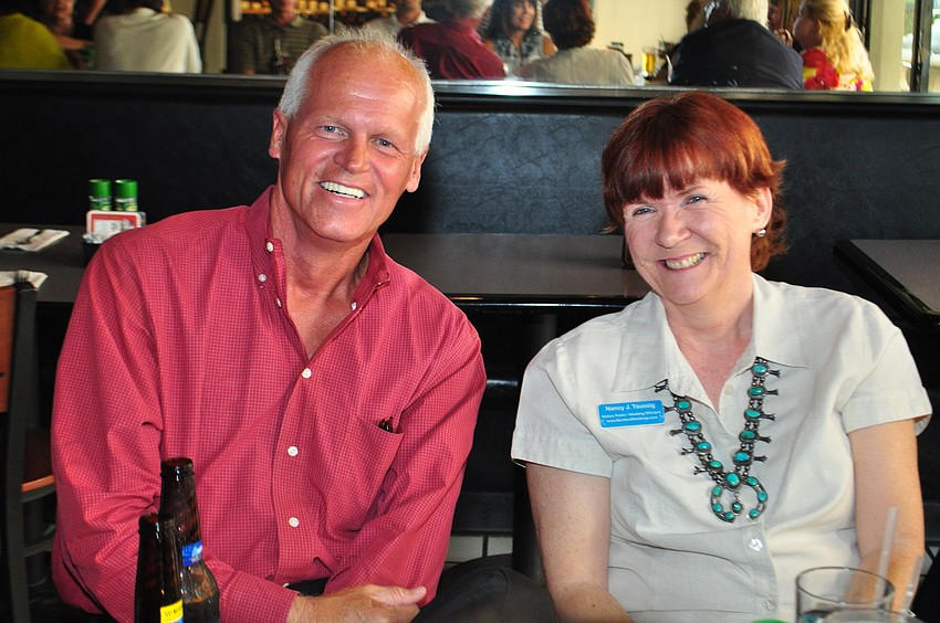 Dawn Pieper with Paul Thomas and Associatesand Nancy Taussig with Barefoot Weddings