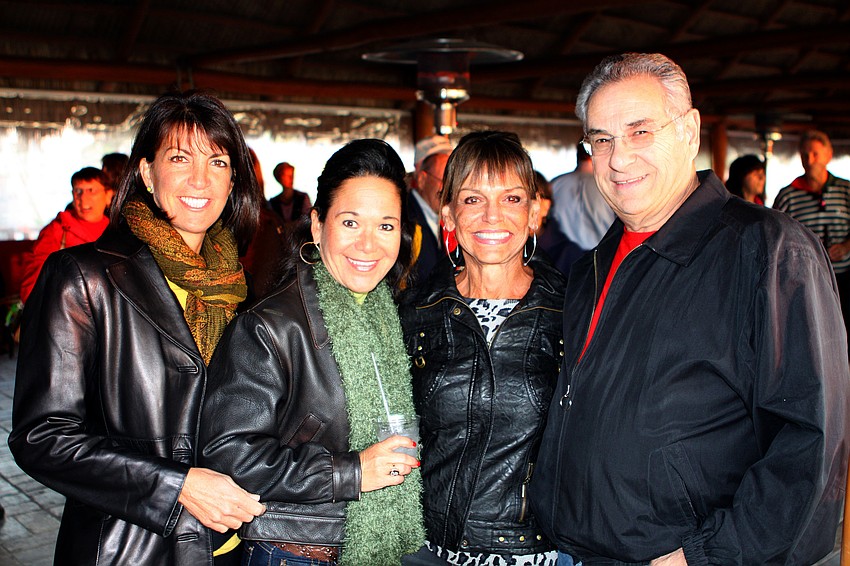 Janine Irizarry, Sandra Ceshker and Susan and Irwin Singer pose together at Dave Sparksâ€™ goodbye party, Thursday, Jan. 5, at the Gulf Drive CafÃ©.