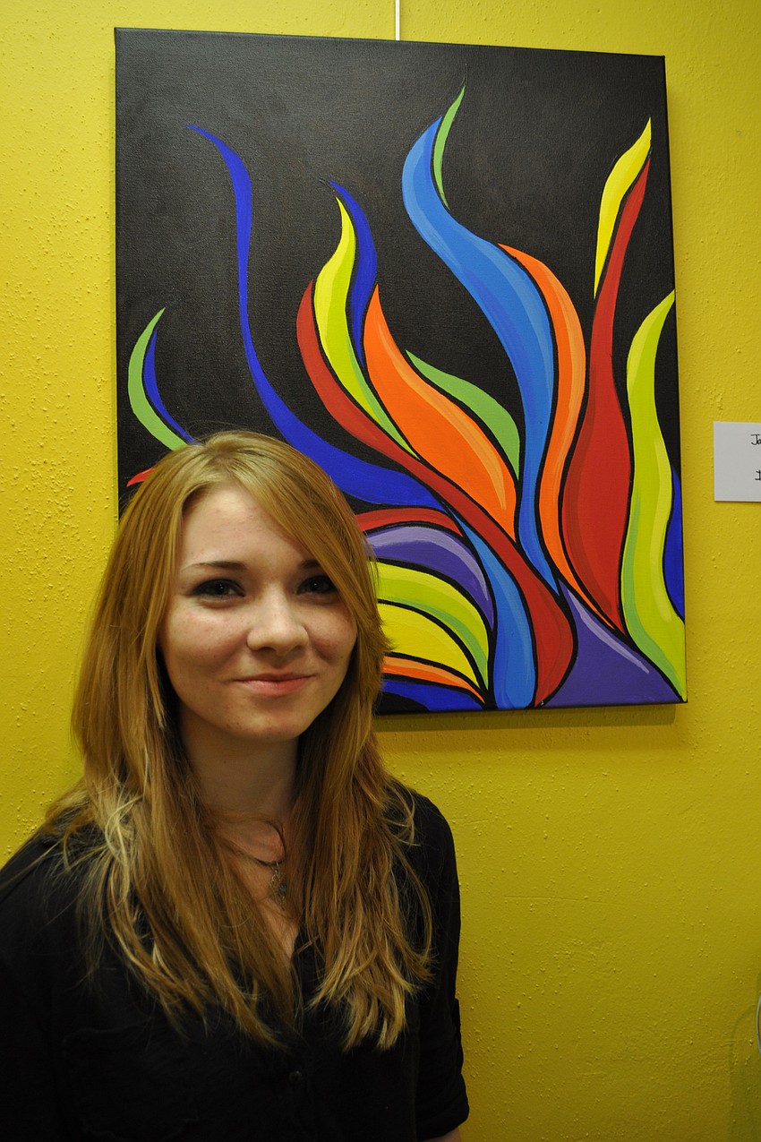 Jamie Moriarty normally focuses on graphic design, but showed off her painting, 