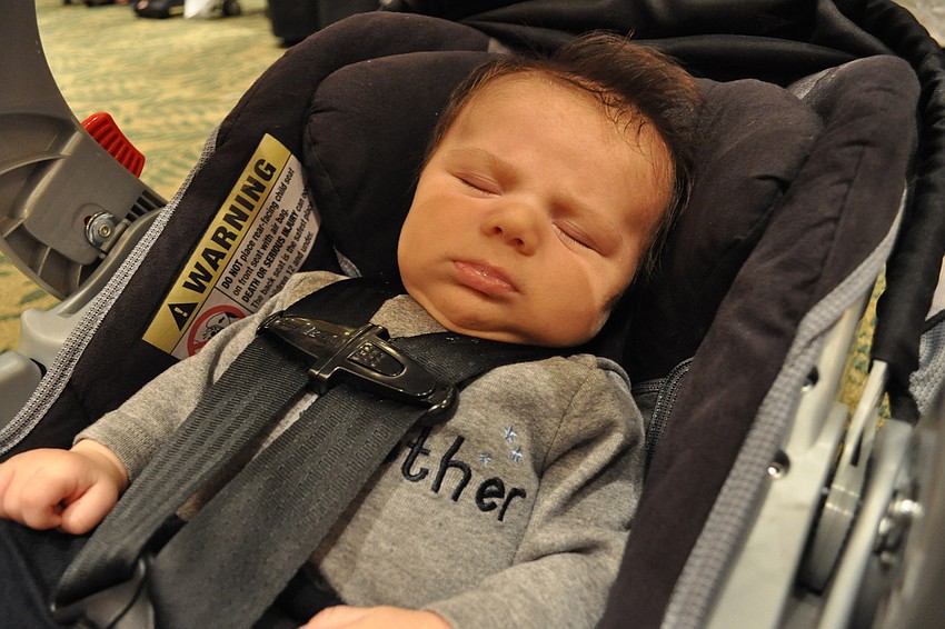 At 7 weeks old, John Motzenbecker was, perhaps, the eveningâ€™s youngest attendee.