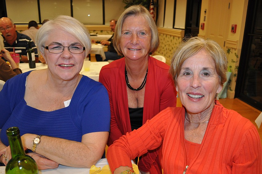 Phyllis  Halloran, Jenny Pound and Betty O'Connor kept each other laughing.