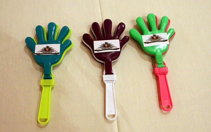 Each table had clappers for the contestants and viewers to use to cheer on their favorite dancers, Sunday, Jan. 15, during the Sarasota Challenge at the Hyatt Regency.