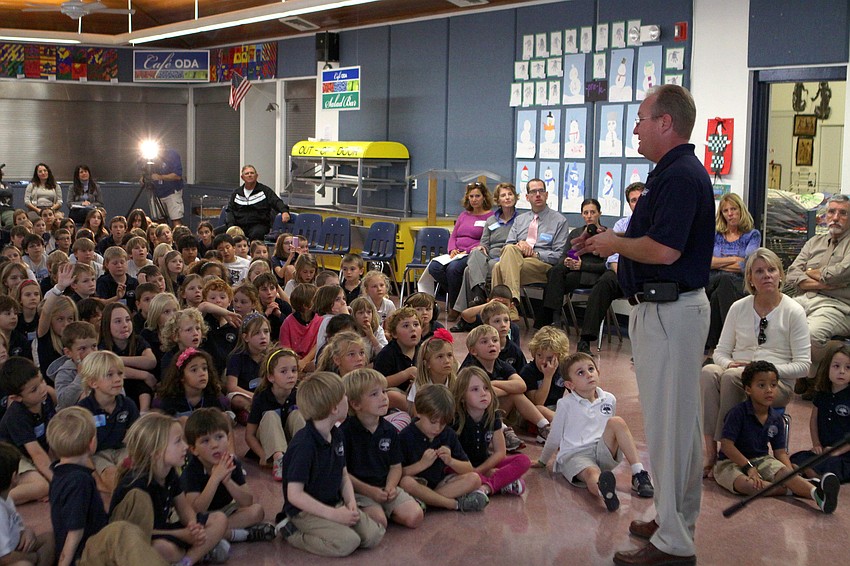 Dan Strzempka talks to the students at Out-of-Door Academy, Friday, Jan. 20, inside the cafeteria.