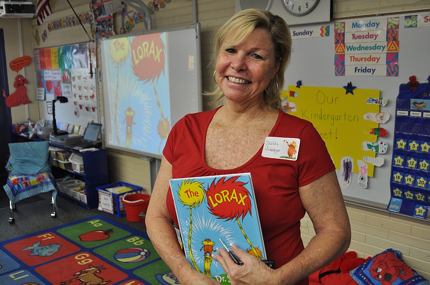 Debbie Jennings volunteered to read to students at Fruitville Elementary.