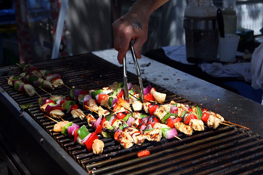 Kabobs were grilling at Knickâ€™s Tavernâ€™s booth, Sunday, March 25, at the 17th annual Giving Hunger the Blues festival.