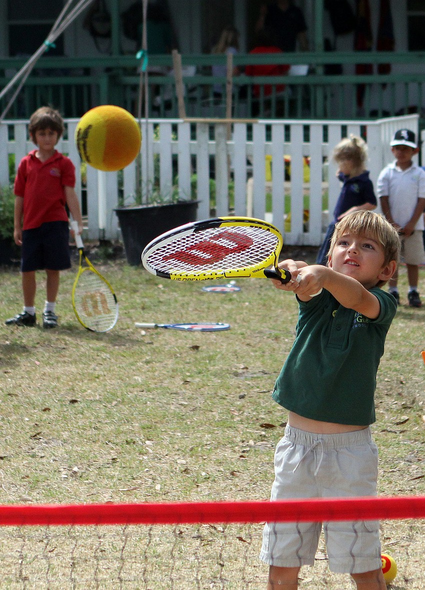Dylan Foley, 6, hits a volley.