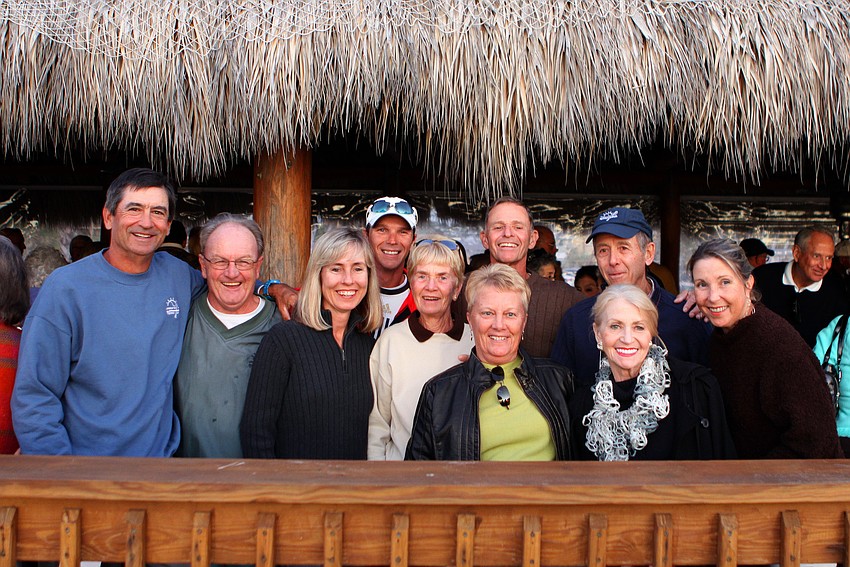 The staff of the Longboat Key Public Tennis Center pose together during Dave Sparksâ€™ goodbye party, Thursday, Jan. 5, at the Gulf Drive CafÃ©.