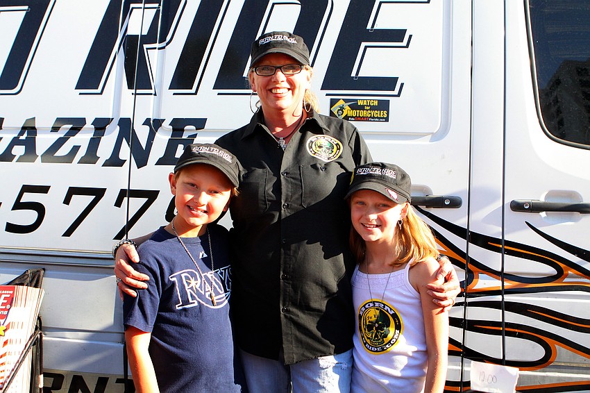 Ronnie, 9, Debbie, and Emily, 10, Galletti pose together, Sunday, Jan. 8, at Thunder by the Bay.