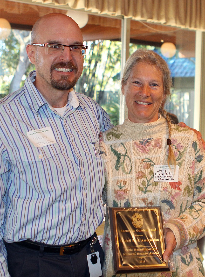 The Laurel Park Association won the Natural Beauty Award, which is given in recognition of a business or association who has preserved the environment with the maximum use of native or natural vegetation.