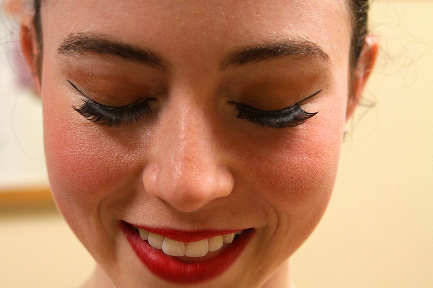 Allison Forsyth shows off her eye makeup and fake eyelashes.