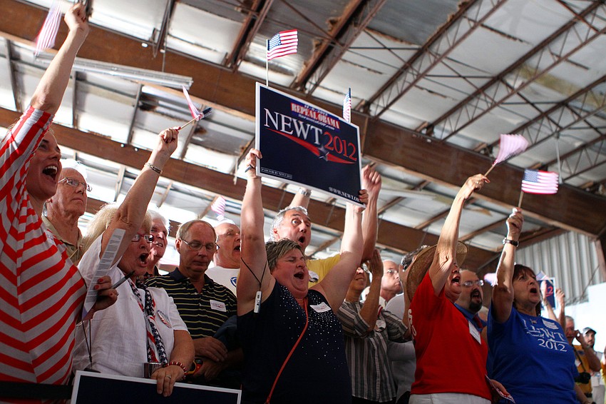 The crowd goes wild as they get excited for Newt Gingrich's arrival.