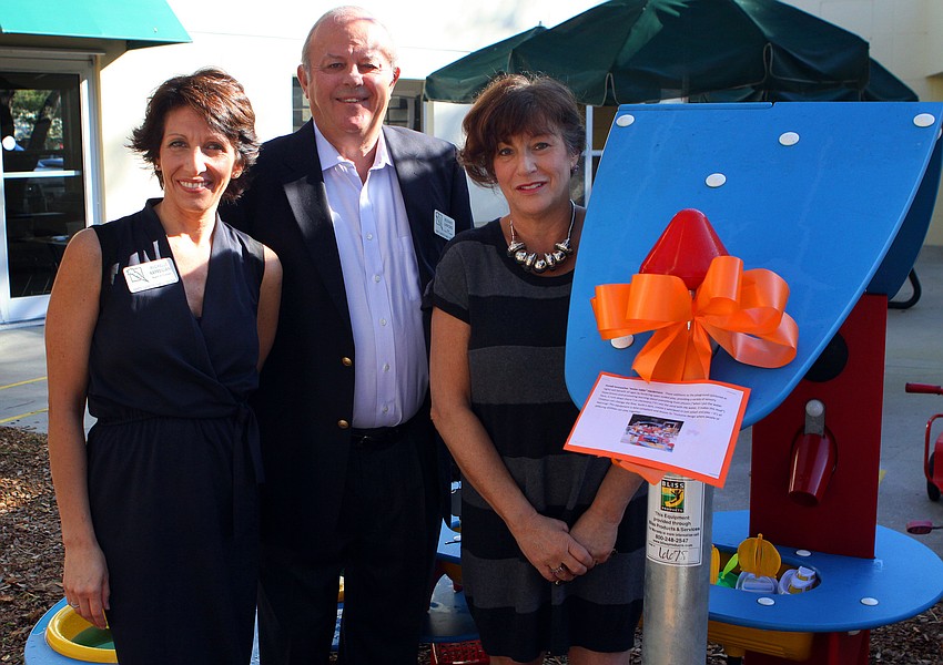 Board members Michelle Karpeilian, Rodney Linford and Geri Jo Manson