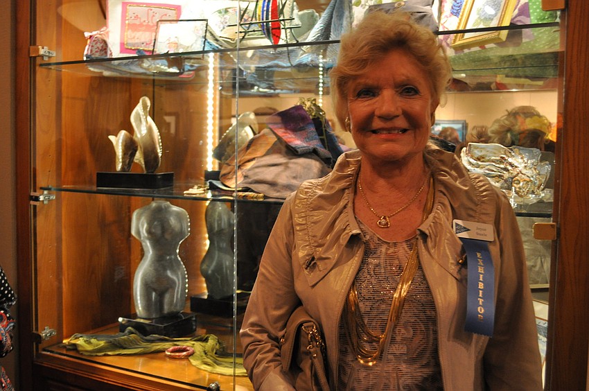 Joyce Steele in front of her sculptures