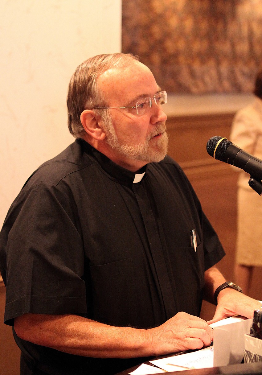 Fr. David Cottingham led the crowd in a prayer before lunch