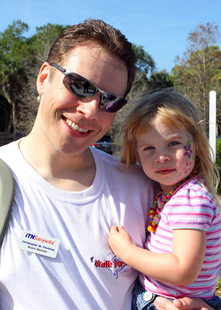 Christopher Pinckney with his daughter Zora, 2.
