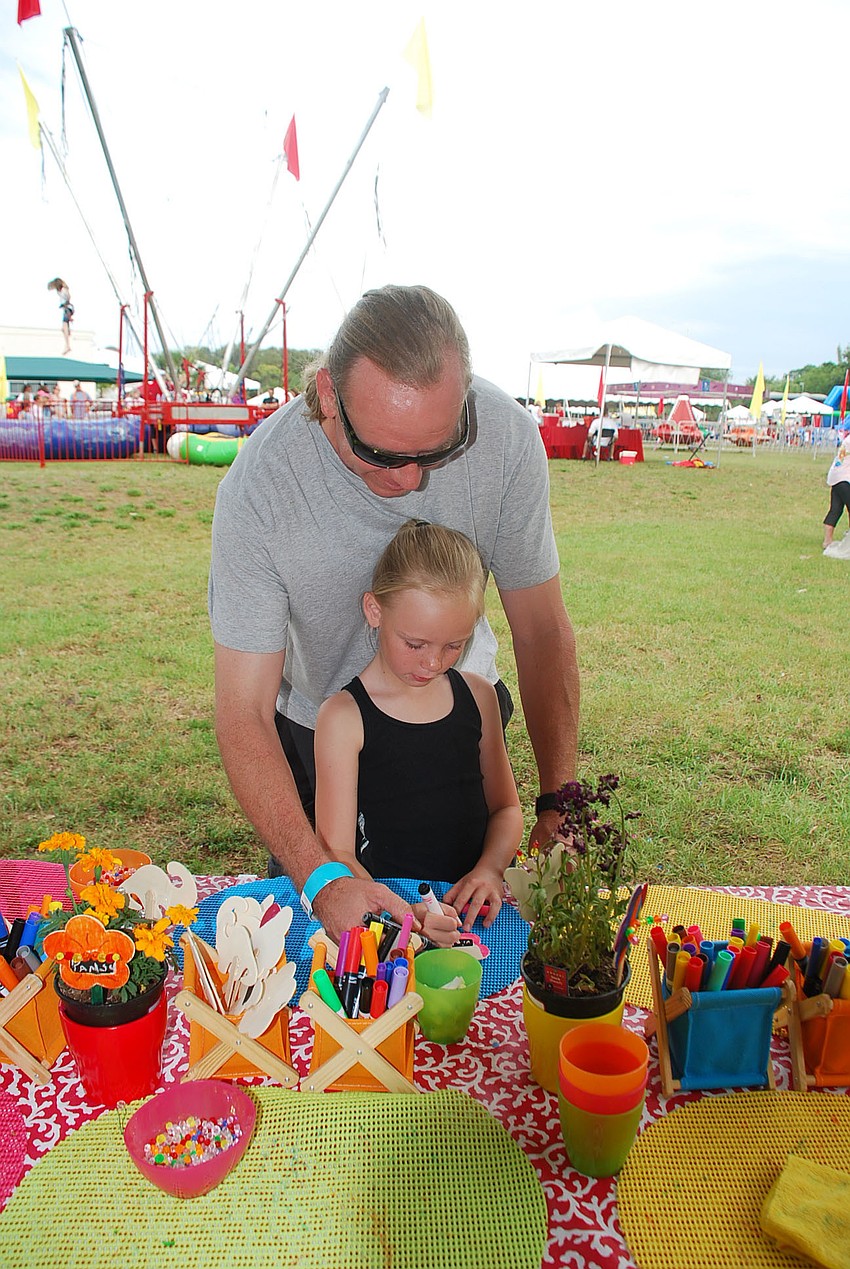 Tom and Violet Sutton doing arts and crafts