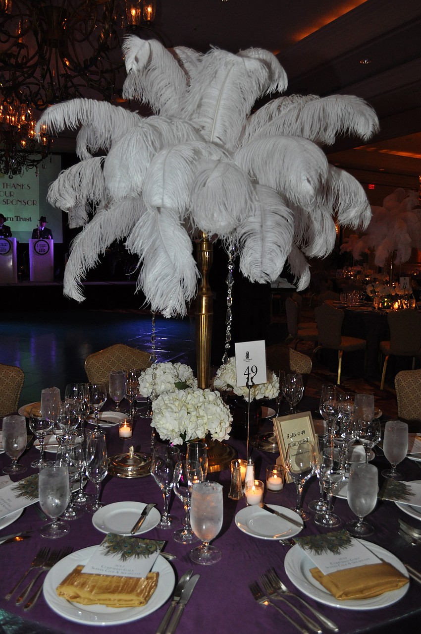 Another type of centerpiece in The Peacock Room was crafted with beautiful white feathers.