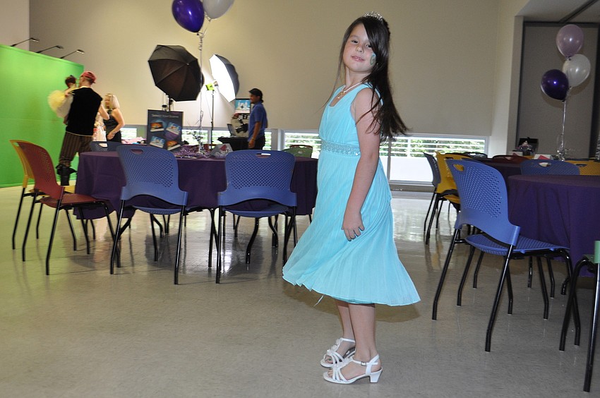 Sydney Christensen spins in her princess dress