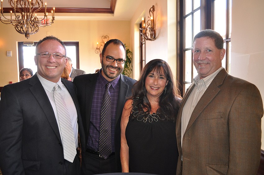 Jim Wilson and Roger Capote with Jo and Ron Pumphrey