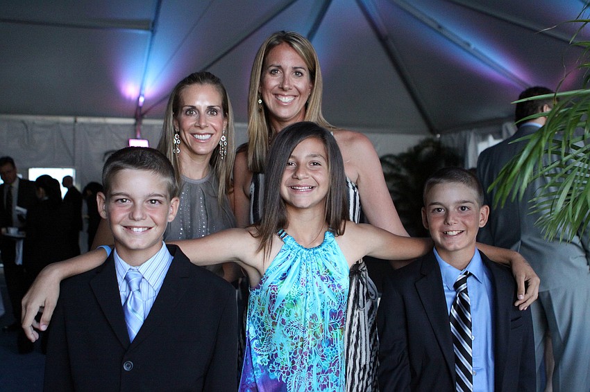 Terri and Sherri Vitale with their children Connor Krug, 9, Sydney Sforzo, 10, and Jake Krug, 9