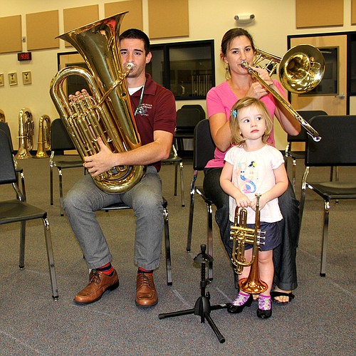 David and Susan Morden are both middle school band directors in Flagler County. Their daughter Emiline may be wondering which school band she wants to play for .  Photo Jacque Estes