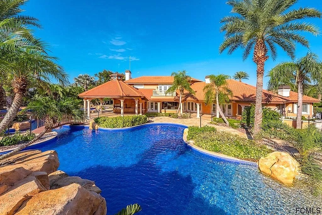 The top transaction features a swimming pool and boat dock. Courtesy photo