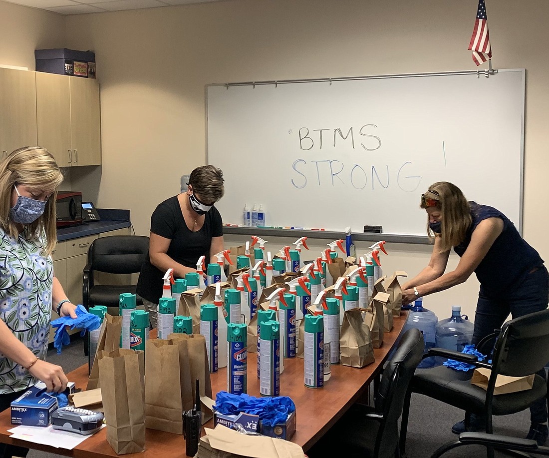 Preparing back-to-school packages for Belle Terre Elementary School staff. Photo courtesy of Flagler Schools