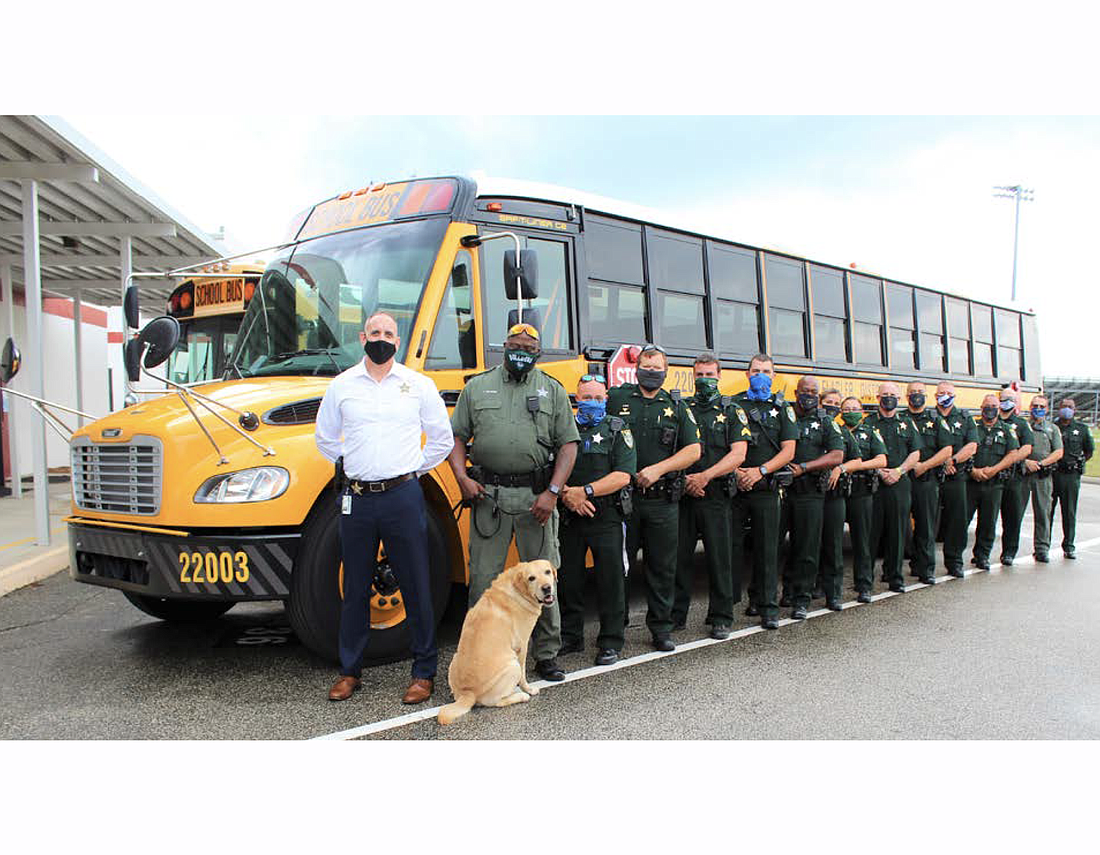 Chief Bovino, Deputy Williams, K-9 Jax, and other FCSO deputies and command staff