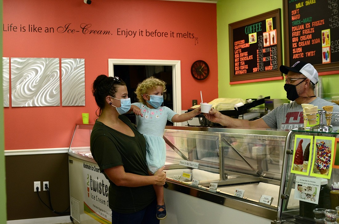 Gloria Marie and Era Serafina order strawberry ice cream at Twisters. Photos by Anastasia Pagello