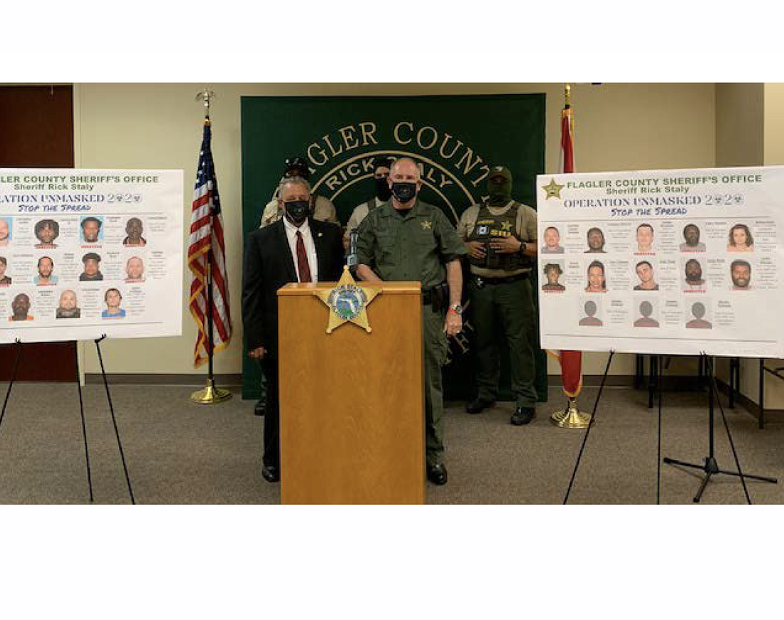 State Attorney RJ Larizza and Sheriff Rick Staly with SIU Detectives at a press conference on Sept. 10
