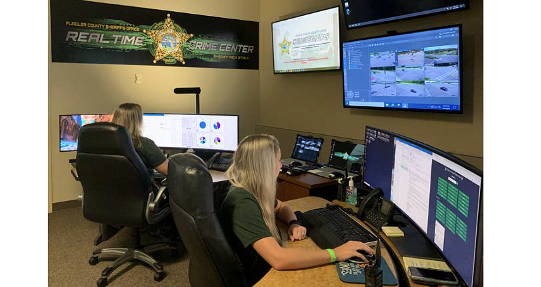 Crime analysts Shannon Sandberg and Nikki North in the Real Time Crime Center. Photo courtesy of the FCSO