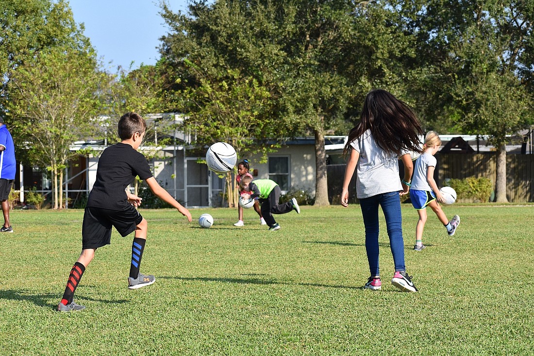Kids practice soccer at the NCCAA event. Courtesy photo.