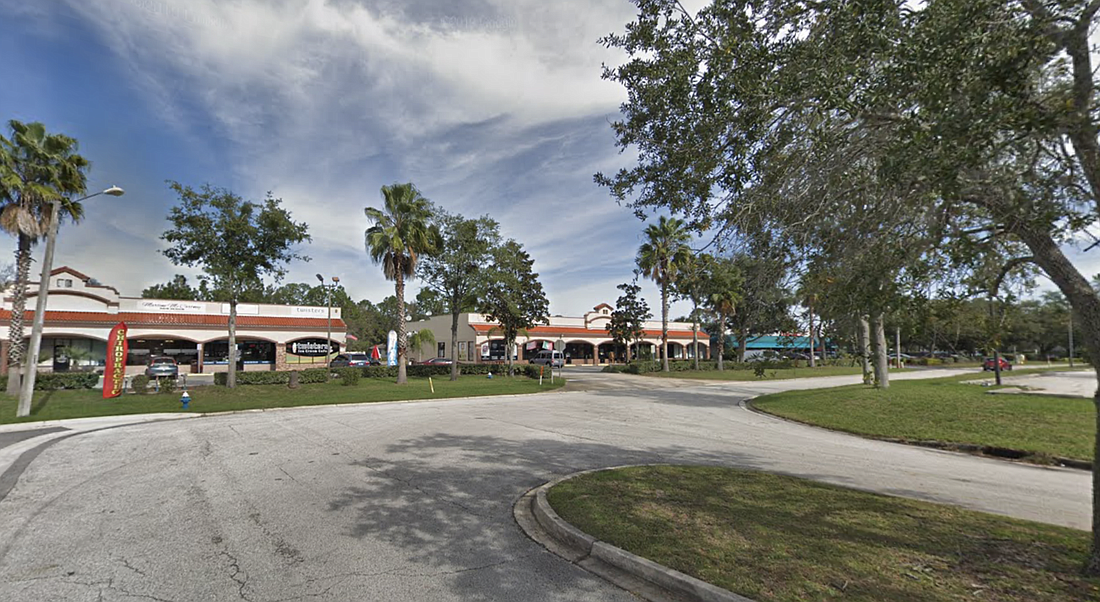 The shopping plaza at 9 Palm Harbor Village Way. Image from Google Maps