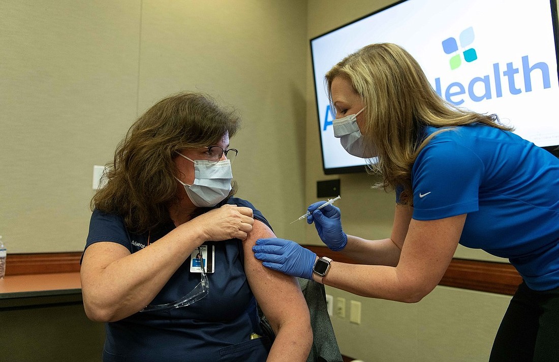 Susan Upper receives the vaccine. Courtesy photo