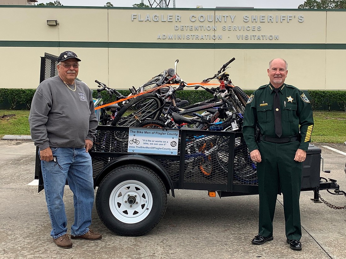 Joe Golan, founder of the Bike Men of Flagler County, with Sheriff Staly.  Courtesy photo