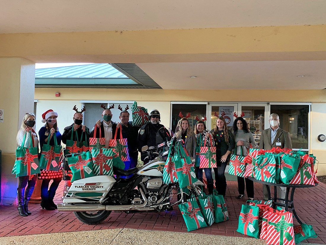 Members of Granny Nannies, FCSO, and other organizations dropping off the gift bags to Grand Oaks.  Courtesy photo