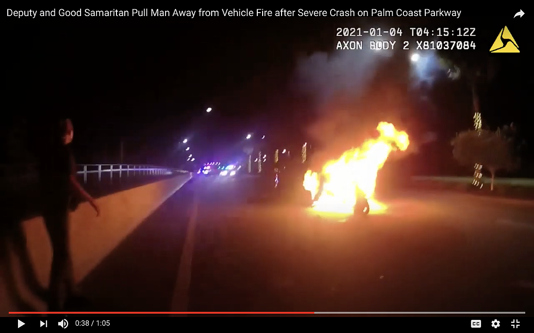 The burning vehicles. Image from FCSO body camera footage