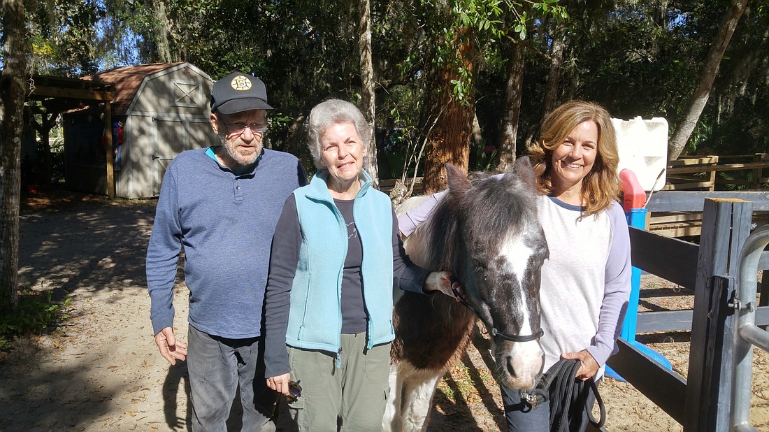 Richard and Helene Davis, who own Whispering Meadows Ranch, and their daughter Kristine Aguirre, the ranch's programs director. Photo by Brent Woronoff