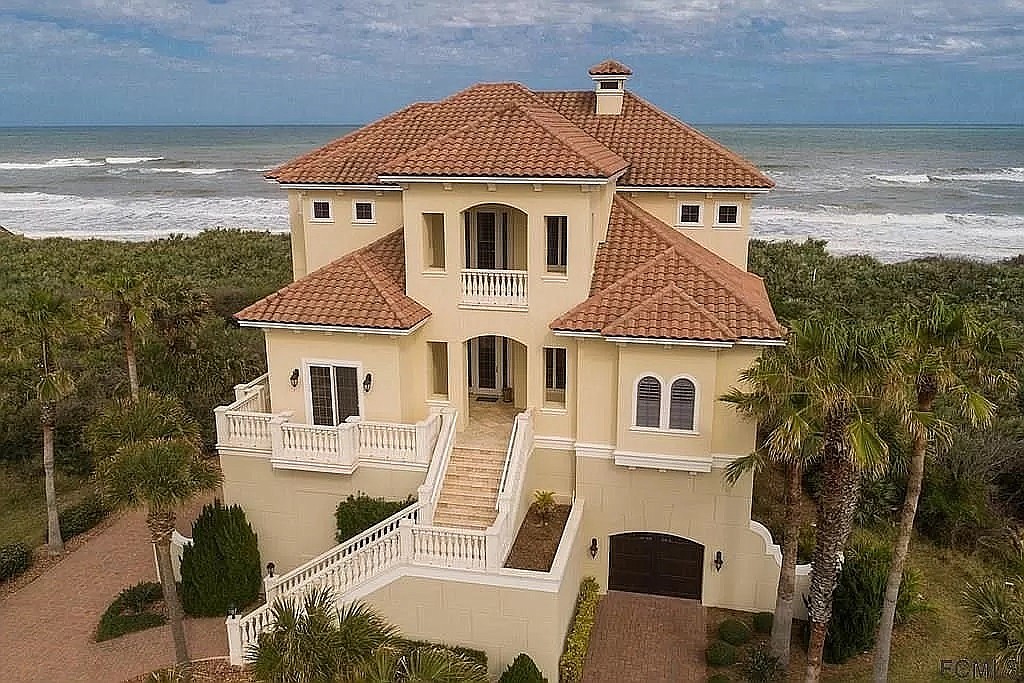 The house features four bedrooms, an elevator and a shared dune walk. Courtesy photo