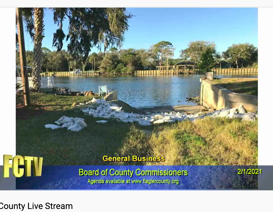 The boat launch on Pamela Parkway, with sandbags placed by the county to prevent flooding. Image from County Commission meeting presentation