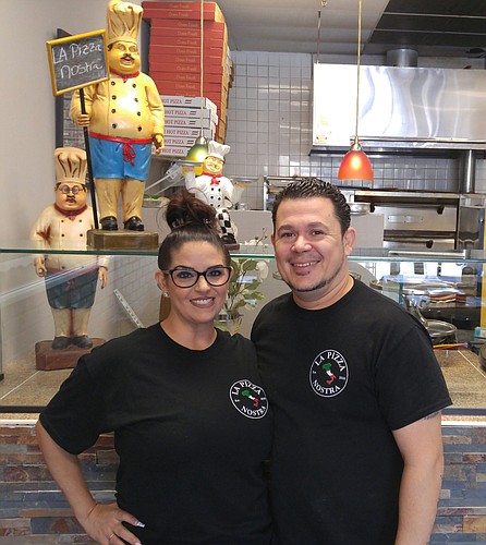 Joey Carbone and his wife, Maria Carbone, opened La Pizza Nostra on Dec. 7 in the old Bruno's Pizza restaurant. Photo by Brent Woronoff