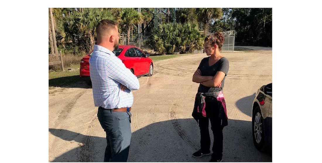 Suspect Angelia Nicole Newsome, 46, speaks with a detective. Photo courtesy of the FCSO