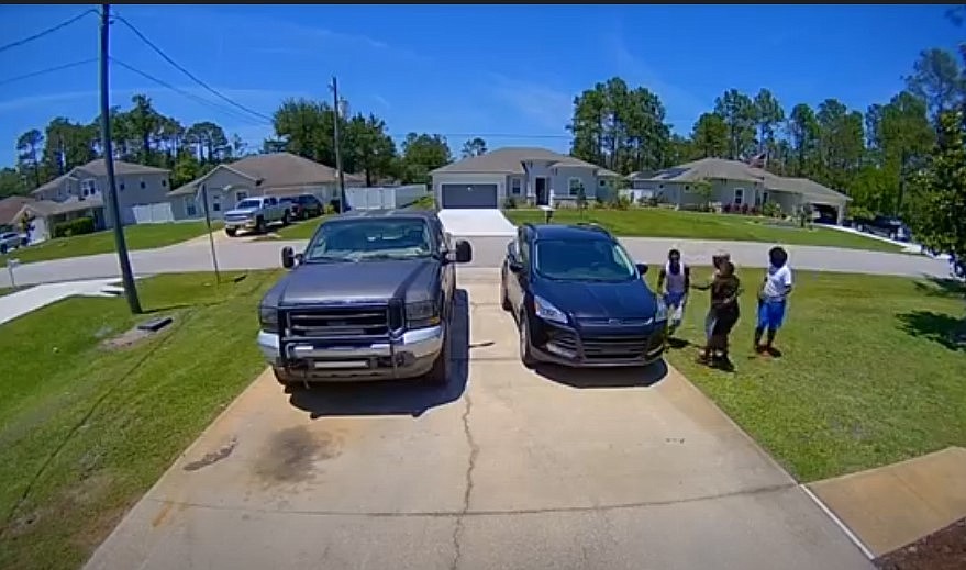 Screenshot of home surveillance footage of juvenile offenders on May 8