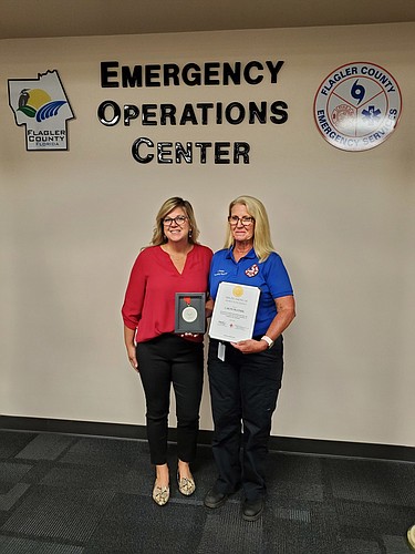 Red Cross Space Coast Chapter Executive Director Rebecca DeLorenzo and Flagler County Community Paramedic Caryn Prather. Courtesy photo